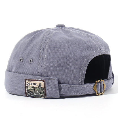 Casquette gris-bleu pour animal : patch « Denim », sangle et boucle arrière.
