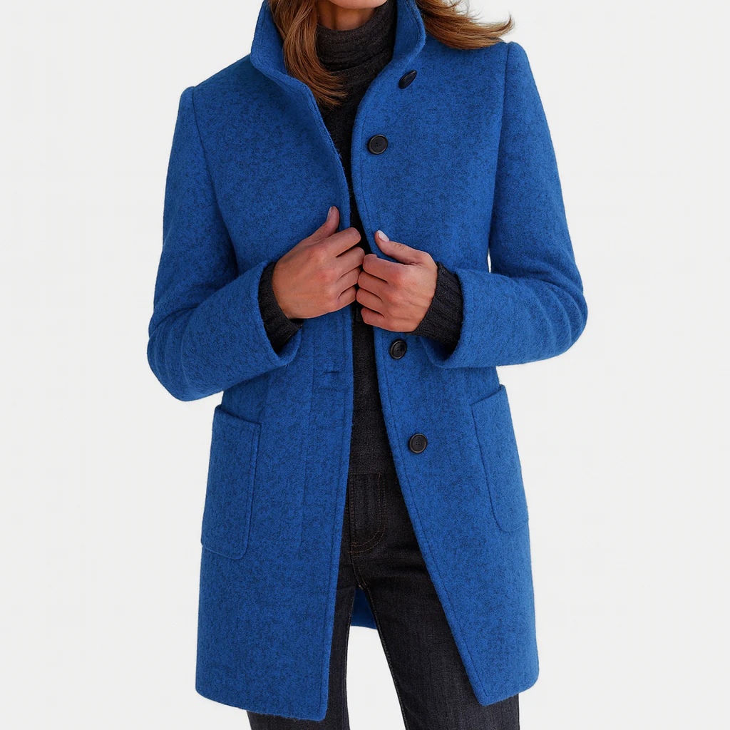 Manteau mi-long en laine bleu à boutons, col montant et poches plaquées