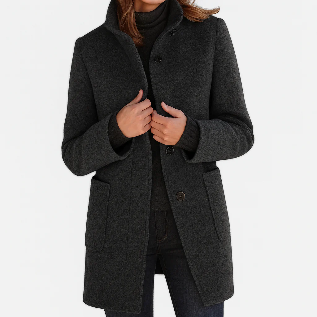 Manteau mi-long en laine noire à boutons, col montant et poches plaquées