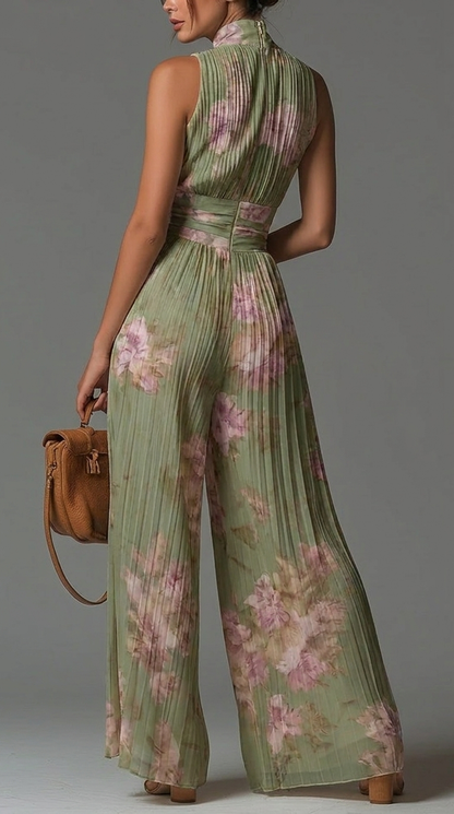 Combinaison plissée mousseline imprimé floral vert et rose, dos nu avec brides.