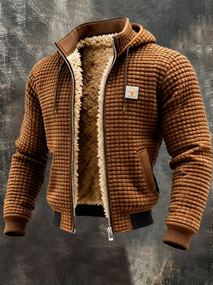 Veste bomber homme orange à capuche, doublure sherpa chaude, finitions cuir brun.