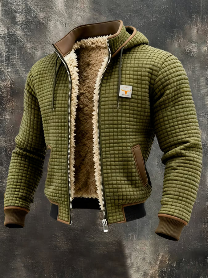 Veste bomber homme verte à capuche, doublure sherpa chaude, texture gaufrée.